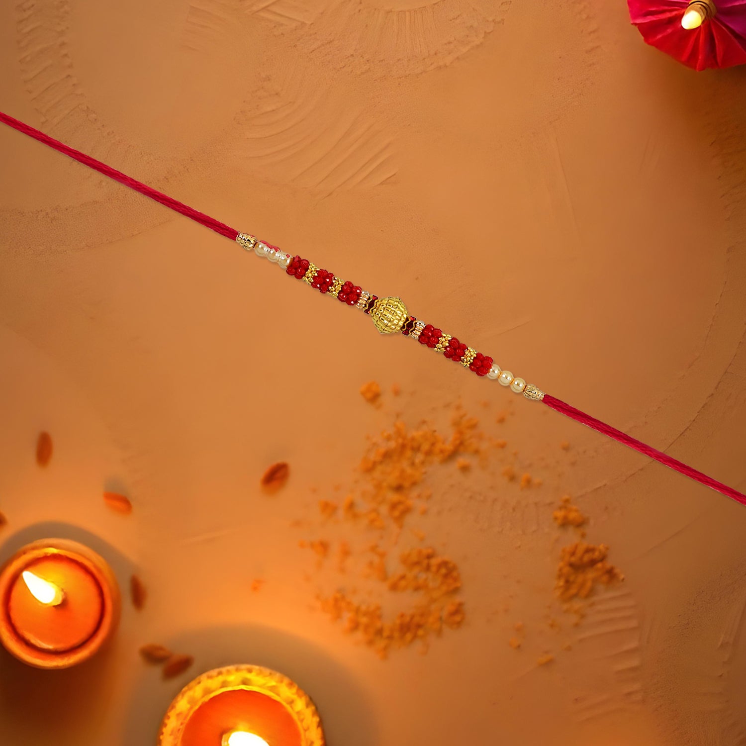 Red Bead Rakhi – Golden Centerpiece & Pearl Details - Image 3