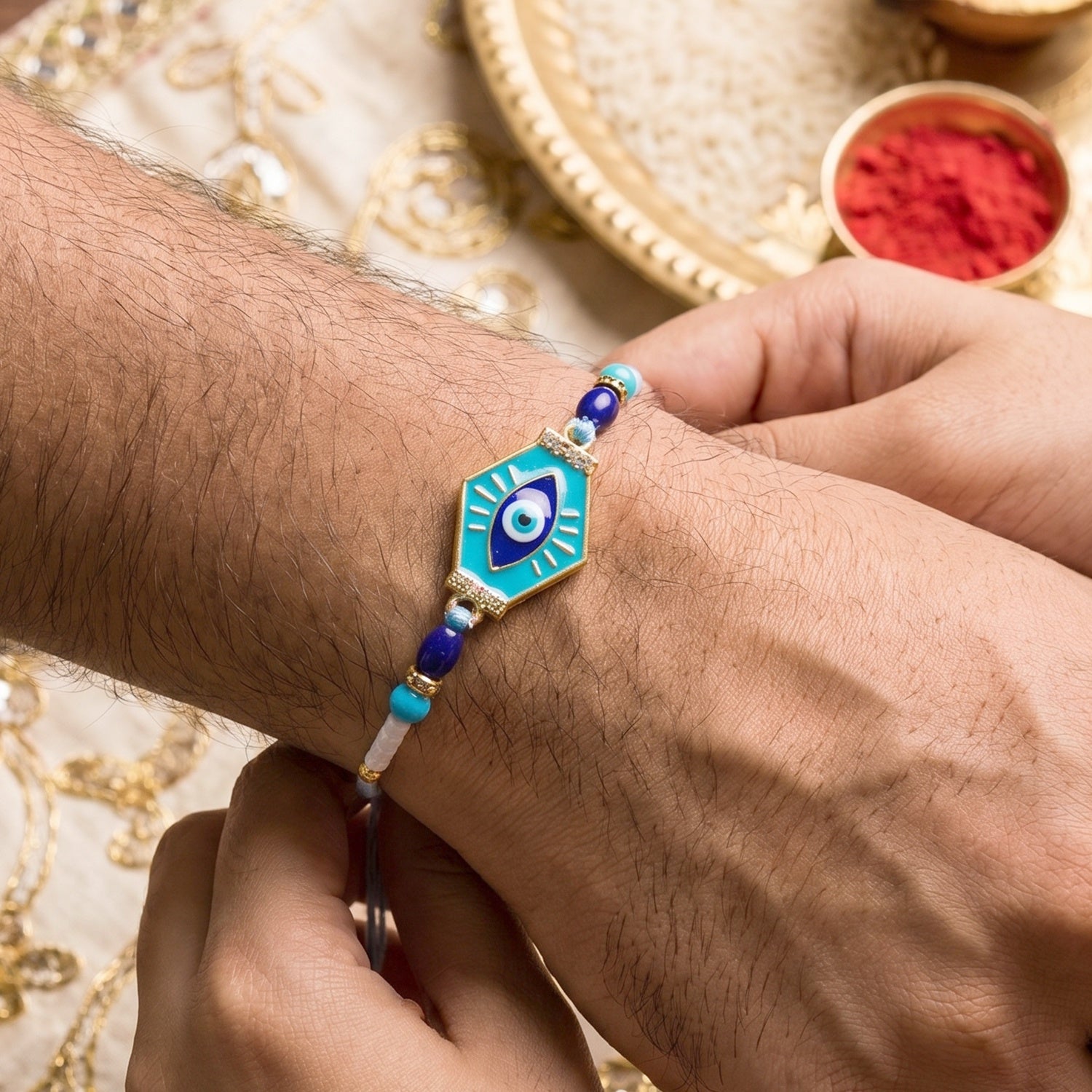 Turquoise Evil Eye Hexagon Rakhi for Rakshabandhan Celebration for Bhai - Image 3